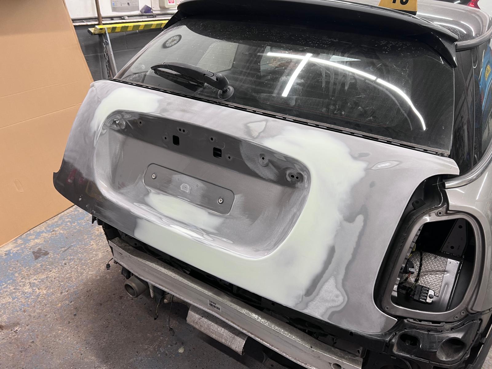 MINI Cooper tailgate stripped back and primed before respray
