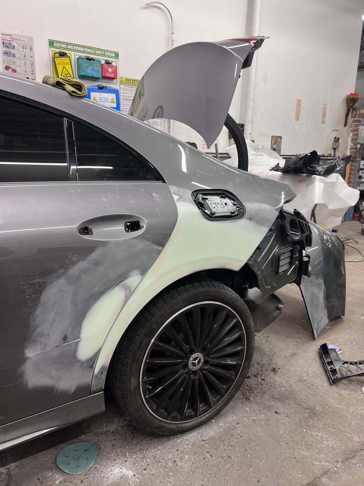 Mercedes rear quarter stripped back and prepared for paint