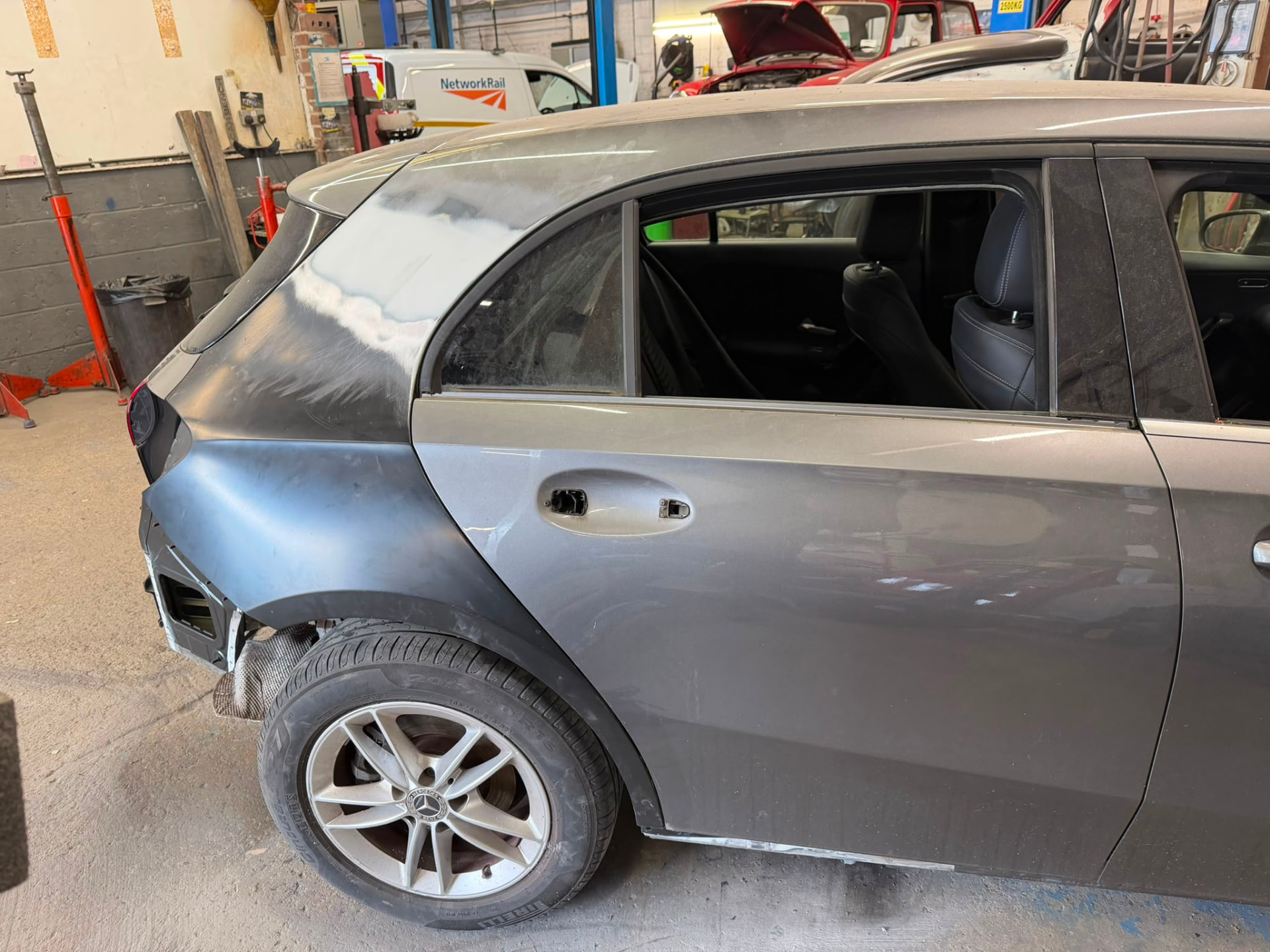 Mercedes A-Class with rear panel removed in the workshop